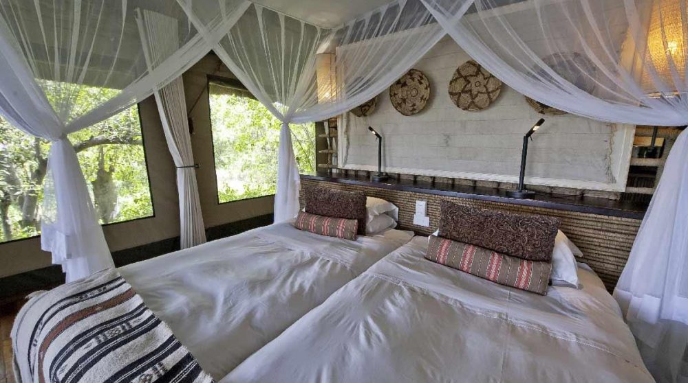 Lits dans une chambre au Savuti Camp