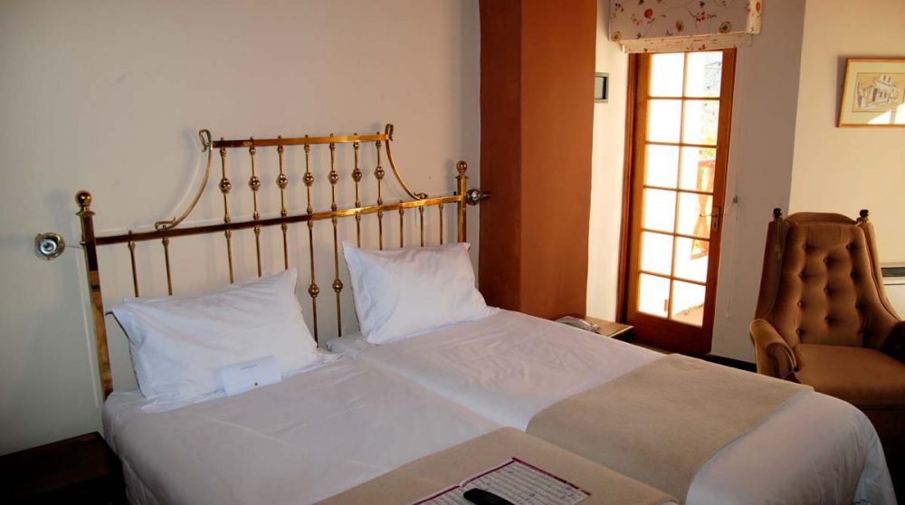 Le lit dans la chambre à Stellenbosch