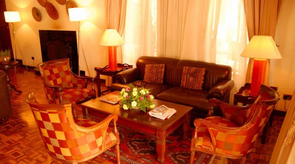 Salon avec cheminée au House of Waine