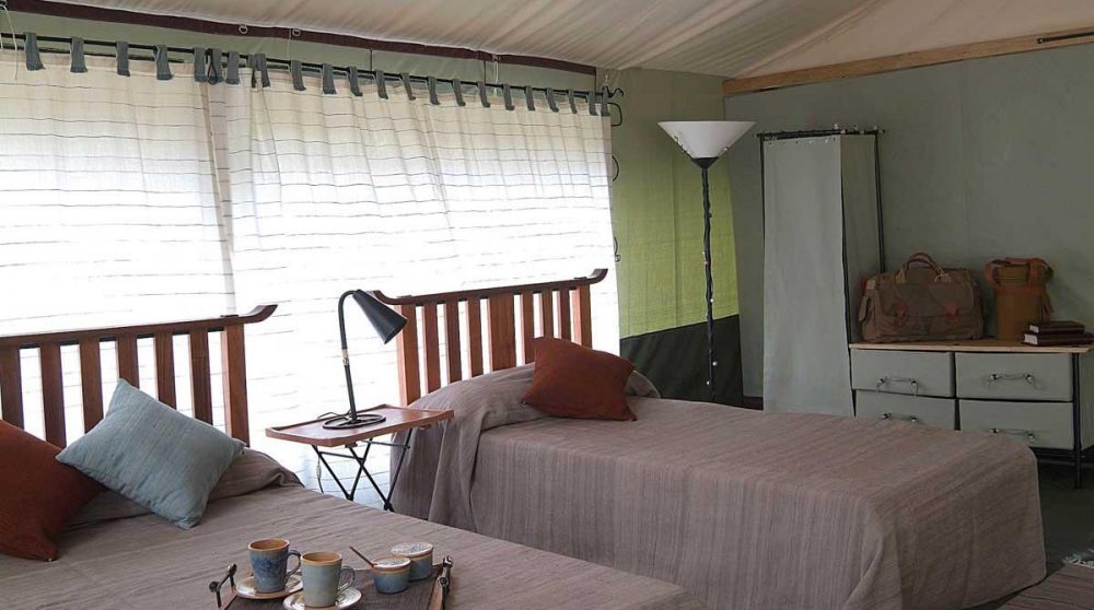Lits dans une tente du Porini Lion Camp