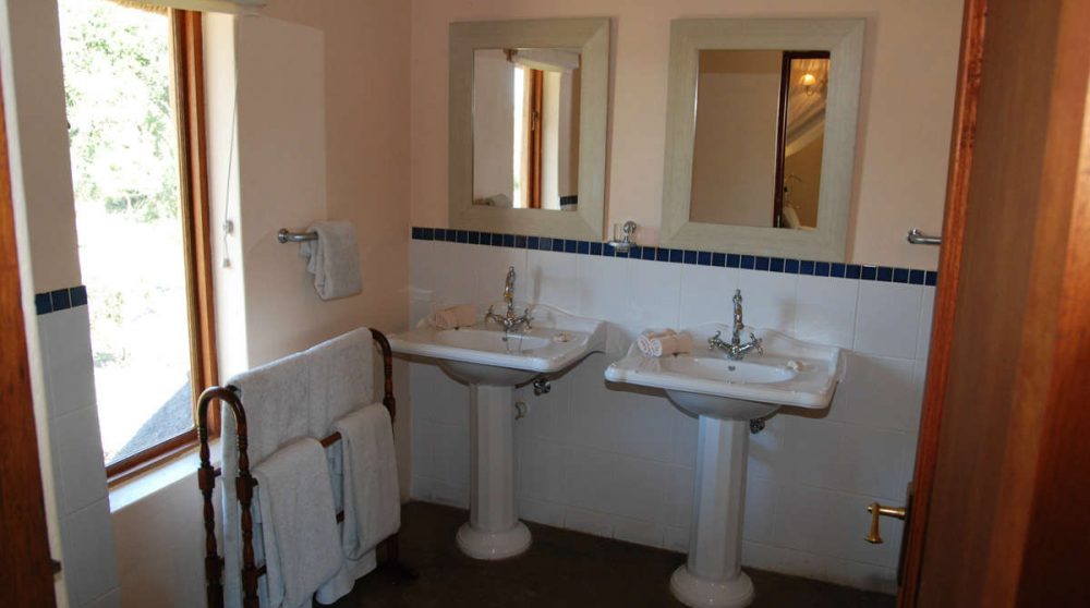 Une salle de banins au Tintswalo Manor House