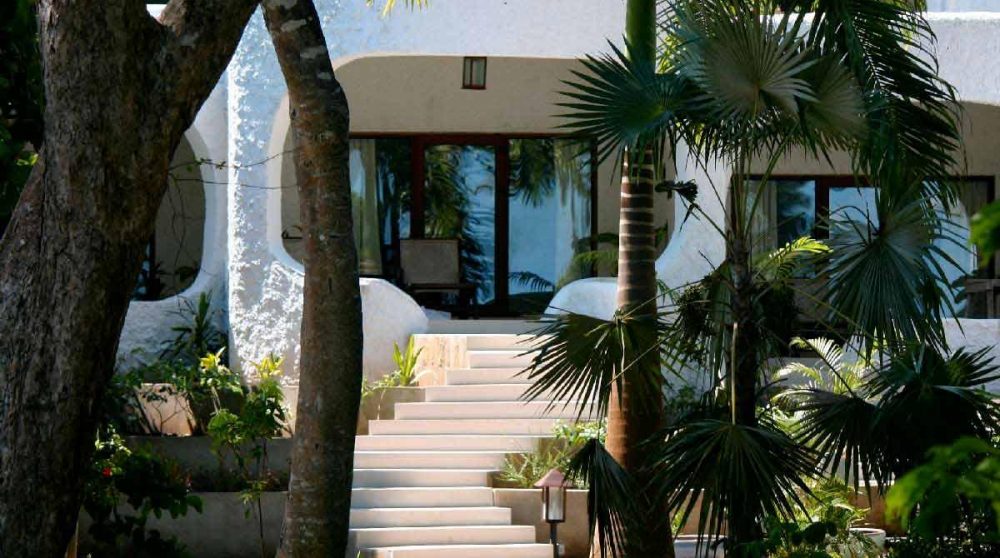 Devant l'une des chambres au Kenya