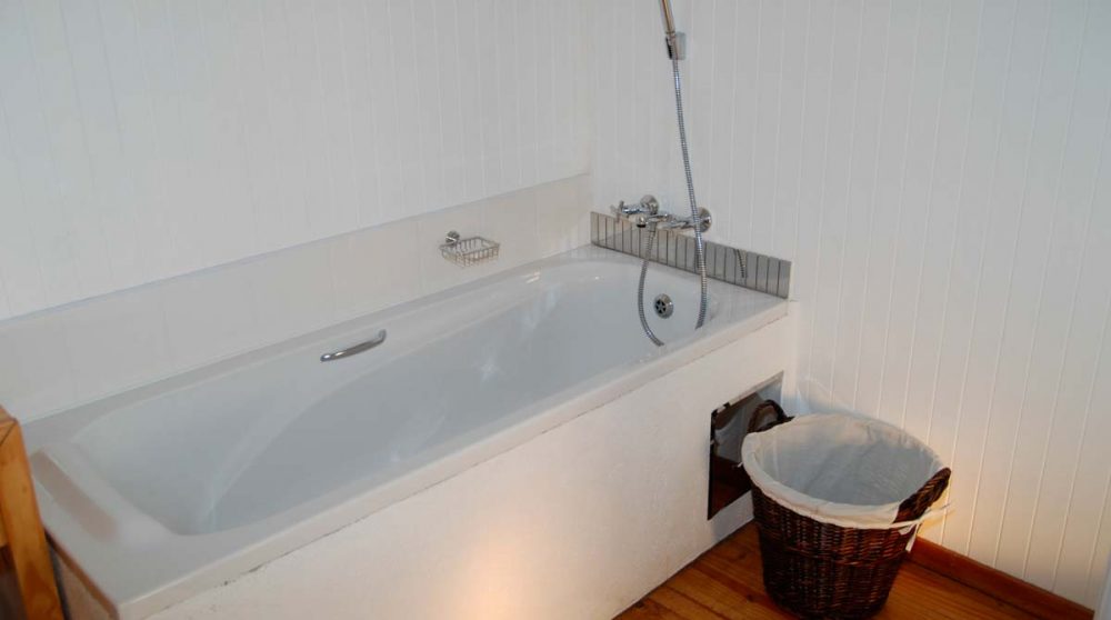 La salle de bains d'une chambre au Graskop Hotel