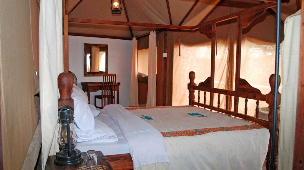 Lit dans une tente au Kirurumu Tented Lodge