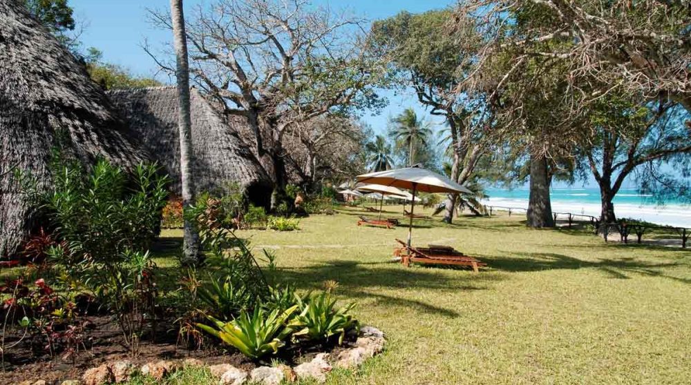 Le jardin avec la plage au Sands at Nomad