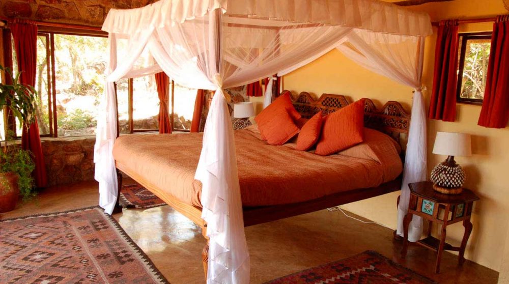 Le lit du cottage à Waterberg