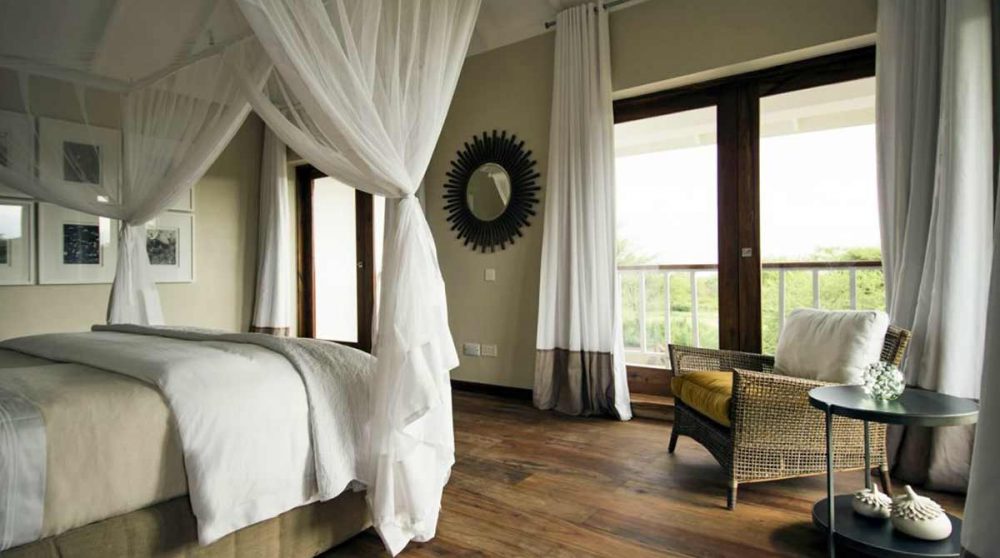 Une chambre avec terrasse au Siringit Villa