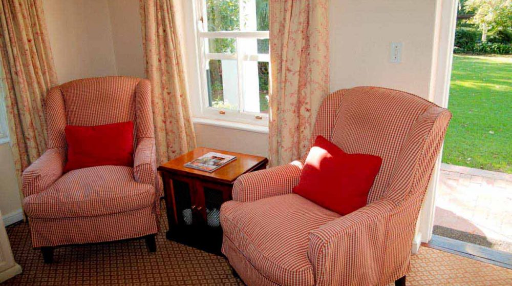 Fauteuils dans une chambre garden au Constantia Uitsig