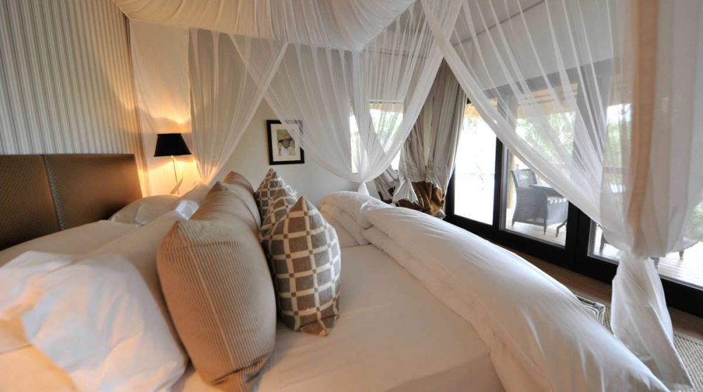 Lit dans une chambre du Londolozi Pioneer Camp