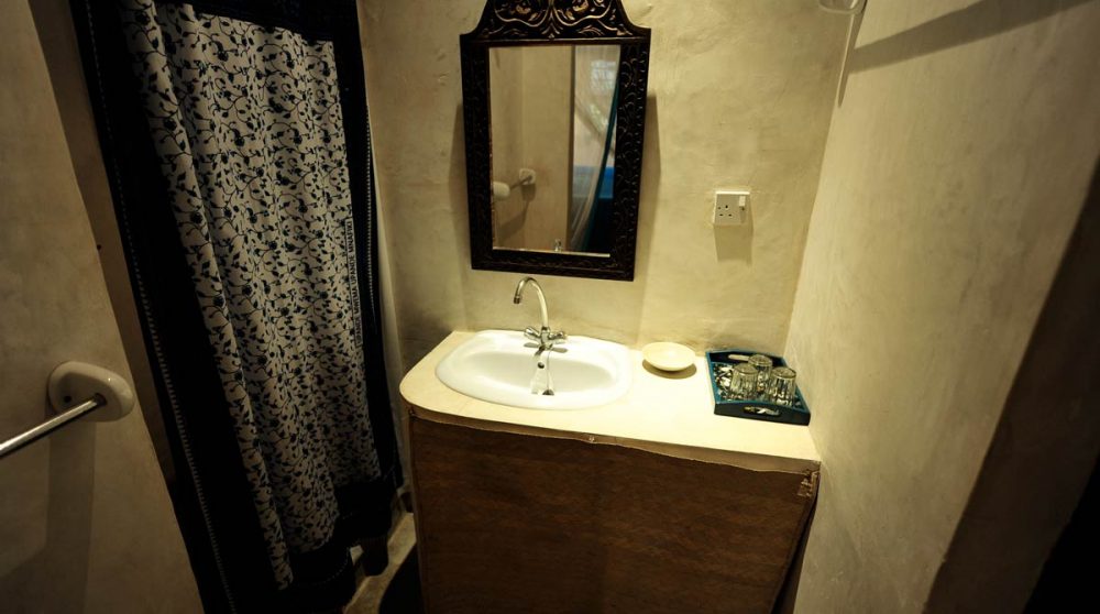 Une salle de bains au Mchanga Beach Lodge