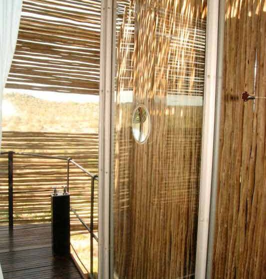 Une douche dans une suite du Singita Lelombo