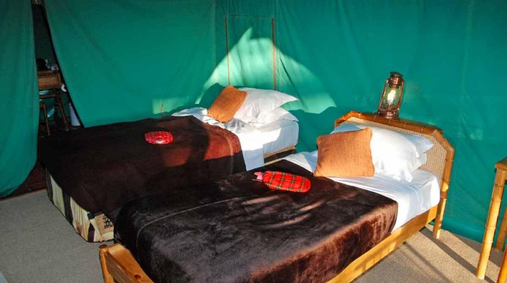 Lits dans une tente au Sweetwaters Tented Camp