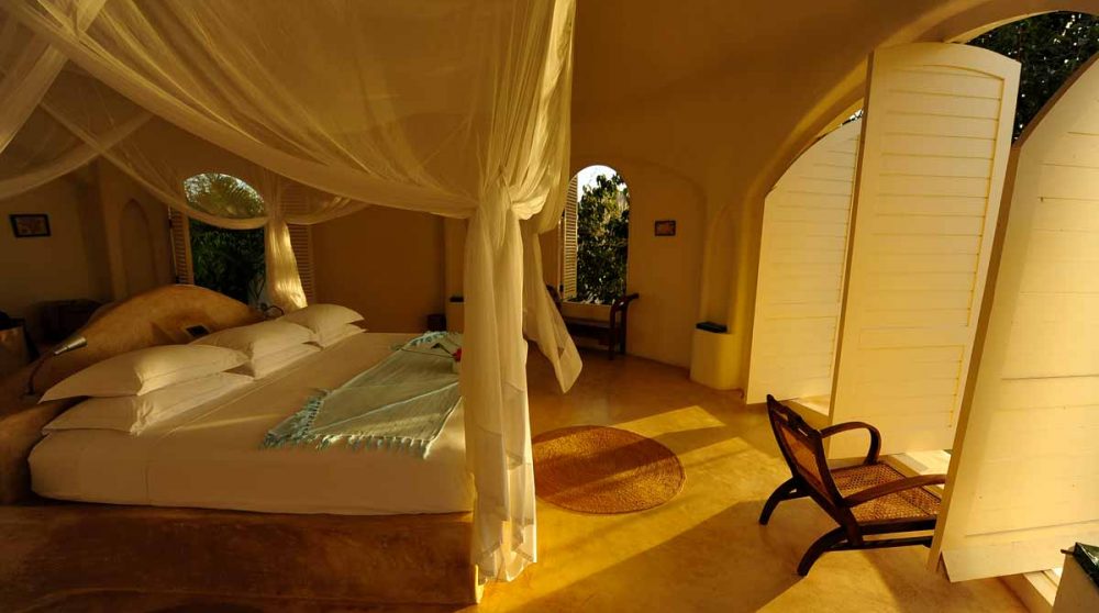 Le lit dans une villa à Zanzibar