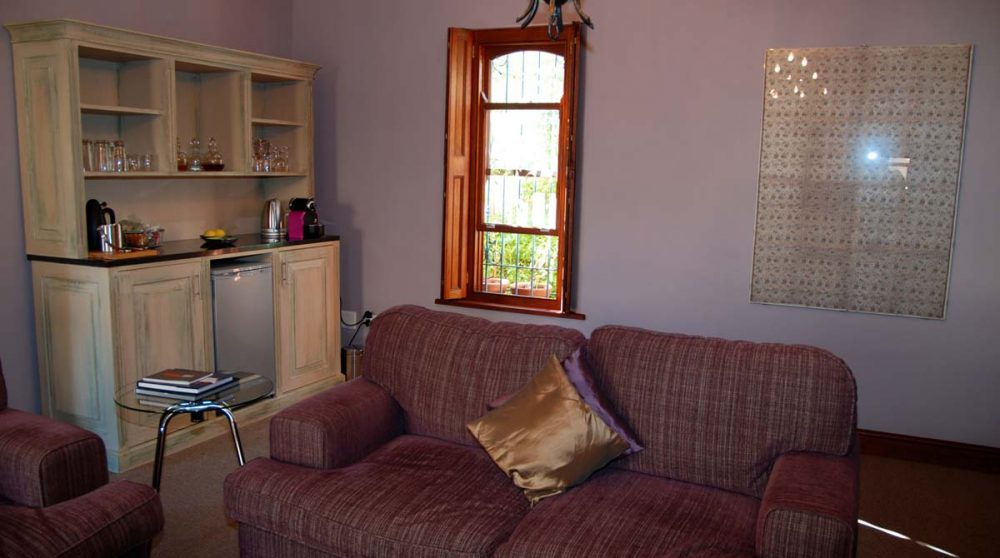 Salon dans une suite de l'hôtel Le Quartier Français