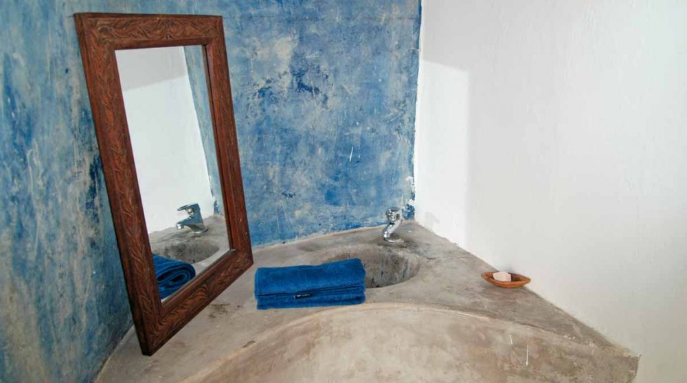 La salle de bains d'une suite au Matemwe Beach Village