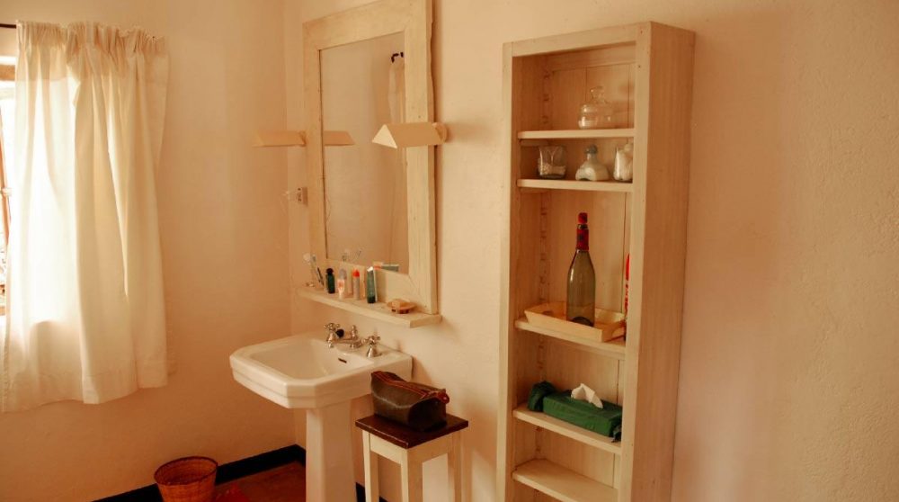 La salle de bains d'une chambre au Sosian