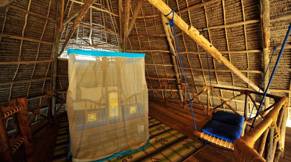 Chambre à l'étage à l'Uguja Lodge