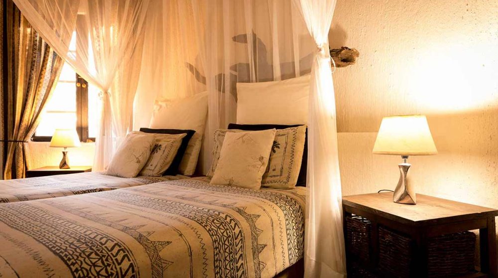 Le lit le soir d'Ezulwini Billy's Lodge
