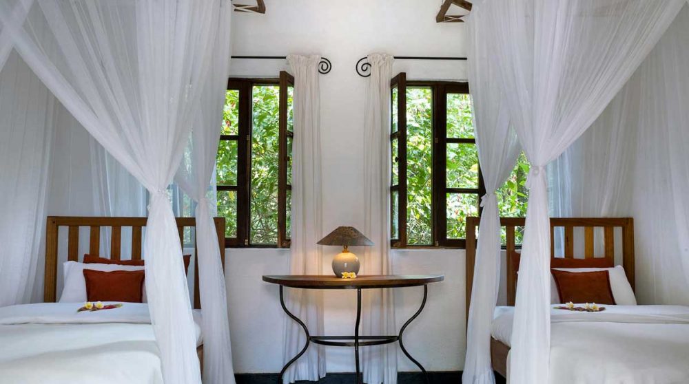 Chambre avec deux lits simples en Tanzanie